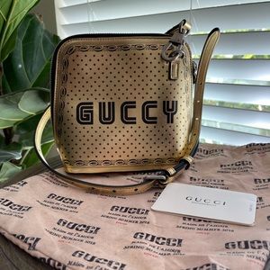 Gucci Gold Guccy Sega Script Dome Mini Crossbody